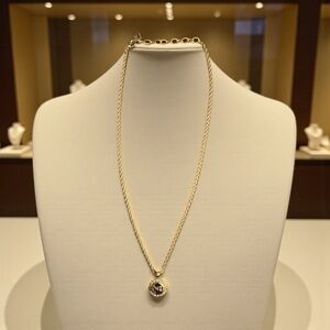 Nina Ricci Gold Necklace with Pendant